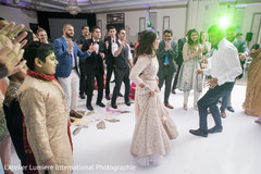 Indian newlyweds dancing photography indian wedding reception,indian wedding reception photography,indian bride and groom
