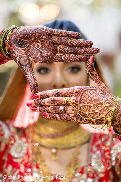 Indian bride showing mehndi art indian wedding gallery,outdoor photography,indian bride,mehndi art