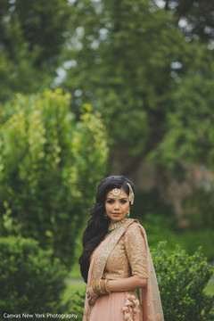 Stunning Indian bride ready for wedding ceremony. indian bride,indian wedding fashion,indian bride's hair and makeup,indian bridal jewelry