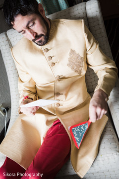 Indian groom receiving a letter from Indian bride. indian groom,indian wedding fashion,indian groom sherwani
