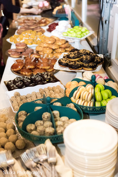 Well assorted treats table capture. indian wedding desserts,indian wedding catering,indian wedding decor