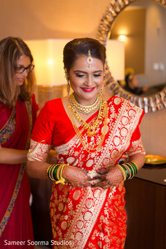 Charming maharani getting ready for her big day. indian wedding gallery,indian bride getting ready,bridal jewelry,indian bride fashion