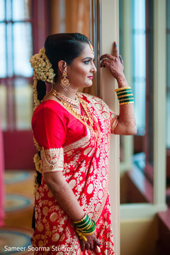 Beautiful indian bride looking out the window indian wedding gallery,indian bride fashion,bridal jewelry