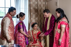 Indian bride with family capture indian wedding gallery,indian bride getting ready,indian bride fashion,bridal jewelry