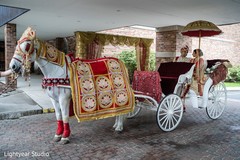 Beautiful capture on indian bride and groom on wedding carriage Beautiful capture on indian bride and groom on wedding carriage