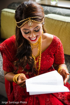 Lovely Indian bride getting ready for wedding ceremony. indian bride,indian bride's jewelry,indian bride's mehndi,indian bride's fahsion