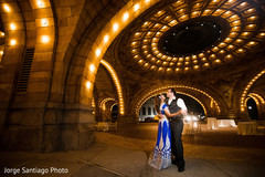 Adorable Indian couple dancing during reception. indian bride and groom,indian wedding reception fashion
