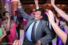 Indian wedding reception guests dancing Indian wedding reception guests dancing
