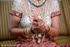 Lovely indian bride putting her bangles on bangles,indian bride jewelry