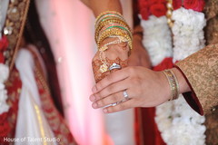 Indian newlyweds holding hands mehndi,indian wedding,indian wedding traditions