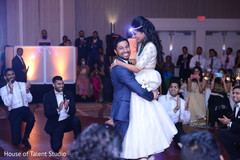 Indian groom carrying the bride bridal lengha,indian wedding,indian groom fashion