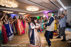 Indian bride and groom dancing during sangeet indian wedding gallery,sangeet,indian bride and groom
