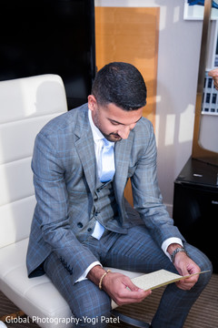 Indian groom reading card from bride indian wedding gallery,indian groom getting ready,indian groom