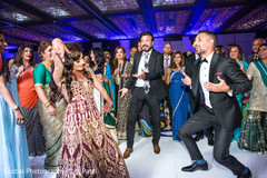 Indian lovebirds rocking the dance floor indian wedding reception,indian wedding reception photography,indian bride and groom