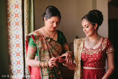 Indian bride putting her bangles on Indian bride putting her bangles on