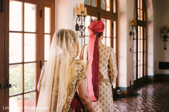 Indian bride walking to her first look Indian bride walking to her first look