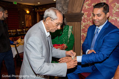 Indian groom receiving a present Indian groom receiving a present