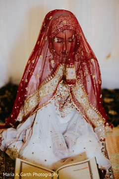 Elegant indian bride during pre-wedding ritual Elegant indian bride during pre-wedding ritual
