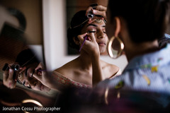 Lovely bride getting her makeup done Lovely bride getting her makeup done