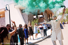 Indian wedding guests cheering during baraat Indian wedding guests cheering during baraat