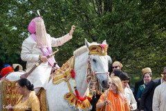Indian groom riding white baraat horse Indian groom riding white baraat horse