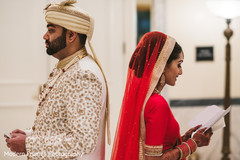 Indian bride and groom about to have their first look Indian bride and groom about to have their first look