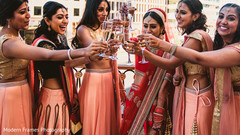 Indian bride toasting with her bridesmaids Indian bride toasting with her bridesmaids