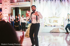 Indian groom performing a choreography Indian groom performing a choreography