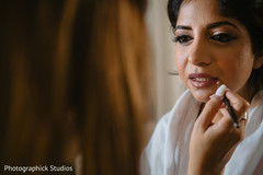 Lovely bride getting her makeup done Lovely bride getting her makeup done
