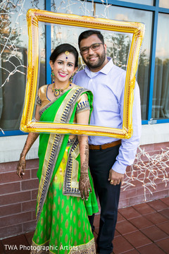 Indian couple during their mehndi party Indian couple during their mehndi party