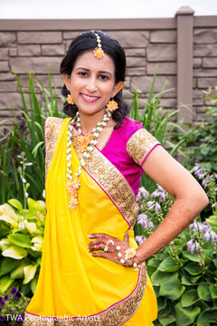 See this lovely maharani in a yellow and pink sari See this lovely maharani in a yellow and pink sari