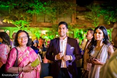 Indian couple at cocktail party Indian couple at cocktail party