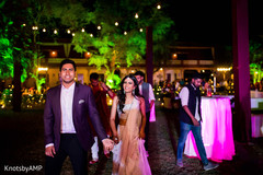 Indian couple enjoying cocktail party Indian couple enjoying cocktail party