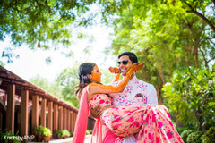 Indian groom carrying the bride Indian groom carrying the bride