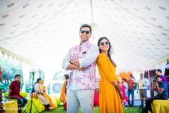 Indian couple posing during haldi Indian couple posing during haldi