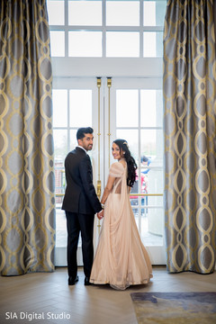 Lovely couple in their reception outfits Lovely couple in their reception outfits