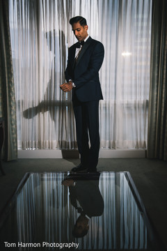 Indian groom getting ready for reception Indian groom getting ready for reception