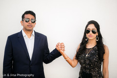 Elegant indian bride and groom posing for photoshoot Elegant indian bride and groom posing for photoshoot
