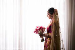 Indian bride glowing in her wedding attire. Indian bride glowing in her wedding attire.
