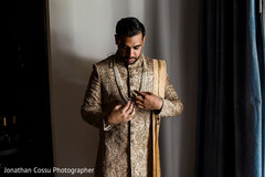 Charming indian groom getting ready Charming indian groom getting ready