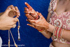 Indian bride putting bangles on Indian bride putting bangles on
