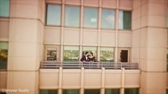 Indian couple in the venue's balcony Indian couple in the venue's balcony