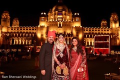 Indian bride with family portrait Indian bride with family portrait