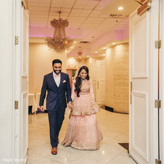 Indian newlyweds about to enter their reception Indian newlyweds about to enter their reception