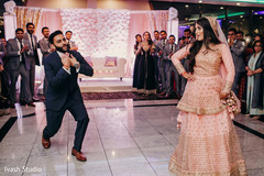 Indian bride and groom giving a performance Indian bride and groom giving a performance