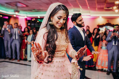 Indian bride and groom dancing Indian bride and groom dancing