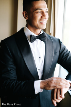 Charming indian groom getting ready scene Charming indian groom getting ready scene