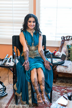 Indian bride showing henna art