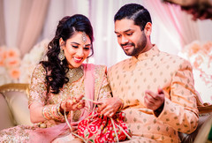 Indian couple receiving their engagement gifts Indian couple receiving their engagement gifts