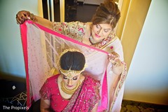 Adorable indian bride getting ready